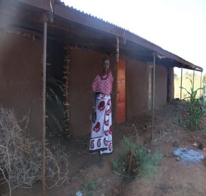 Regina is now a proud owner of a semi permanent house in Rupa trading center. She built it from her earnings in mining